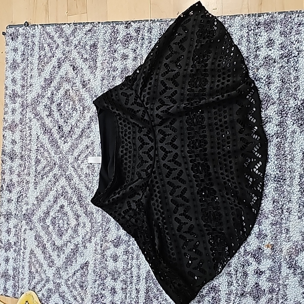 Brand new beachwear skirt with bottoms underneath.  BLACK LACE sz Small